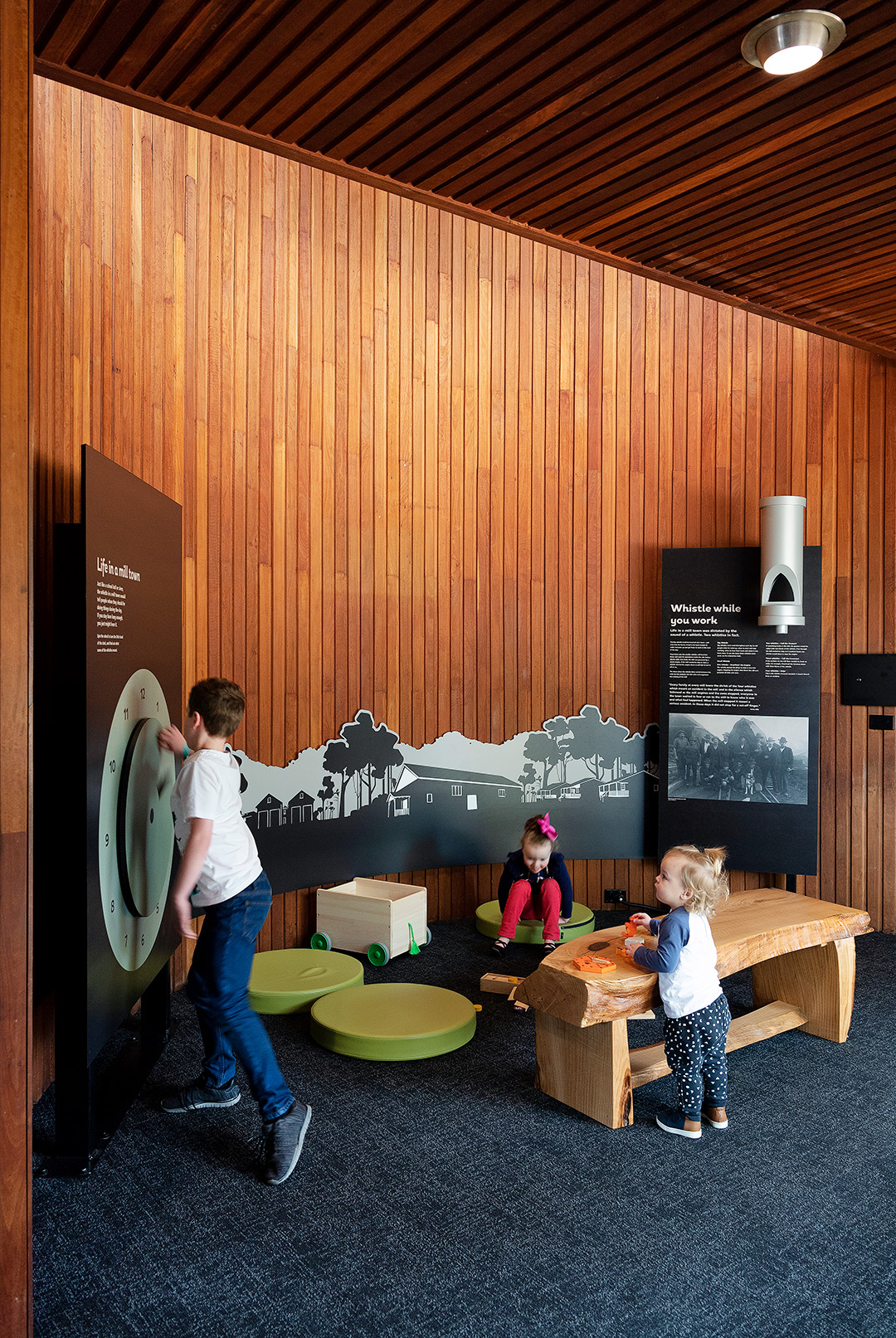 children playing in the timber museum